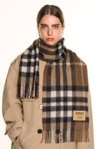 A brown-colored cashmere scarf in a stylish premium box.