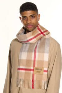 An Edinburgh Cashmere stole alongside some accessories.