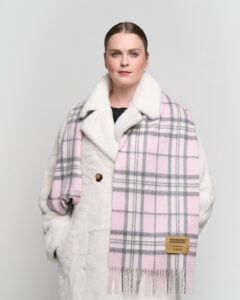 Curated Valentine’s Day display showing multiple scarves styled as luxury gifts